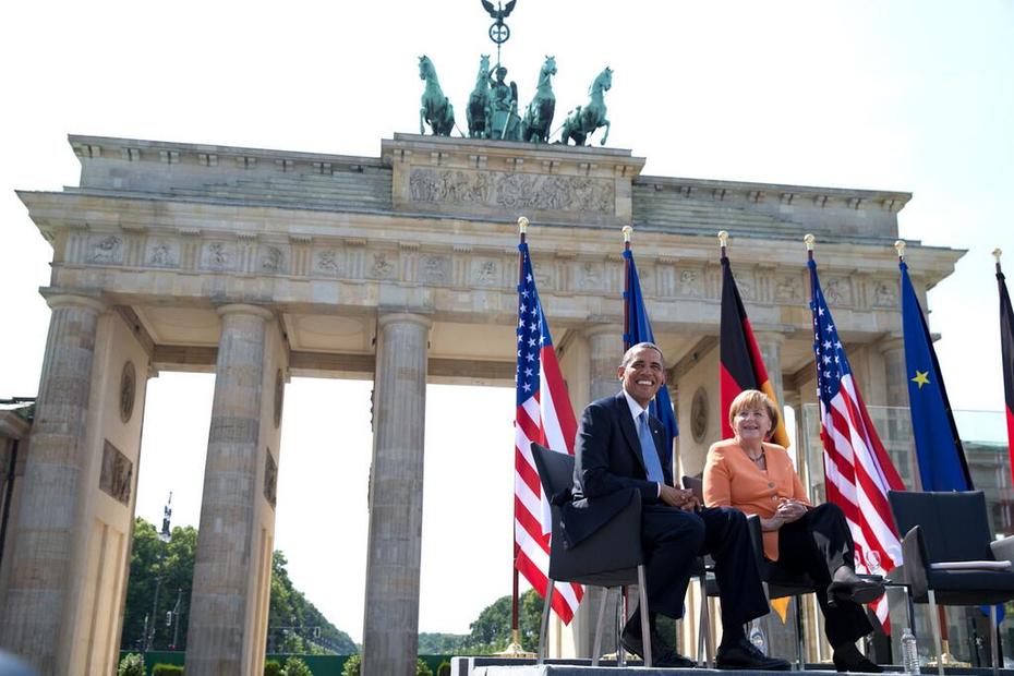 United States President Barack Obama and German Chancellor Angela Merkel at the Brandenburg Gate in Berlin on 19 June 2013