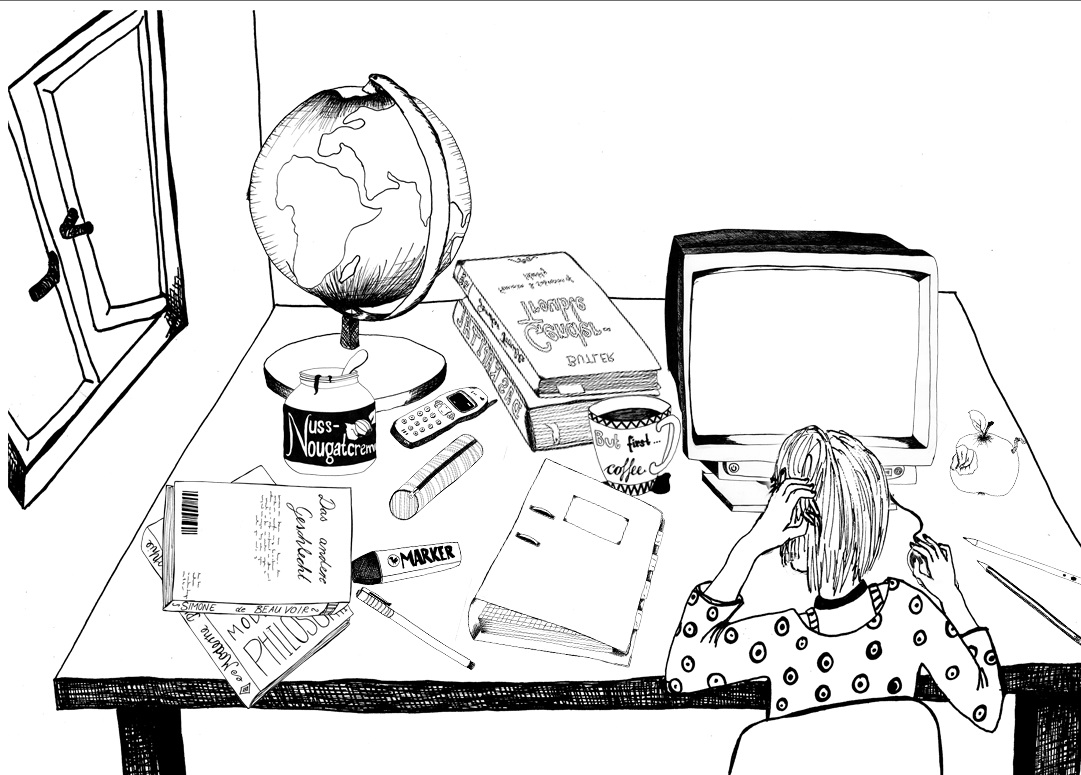 Young woman studying at her desk